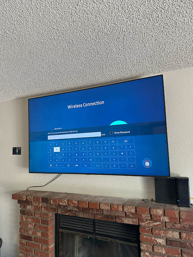 Brick fireplace TV